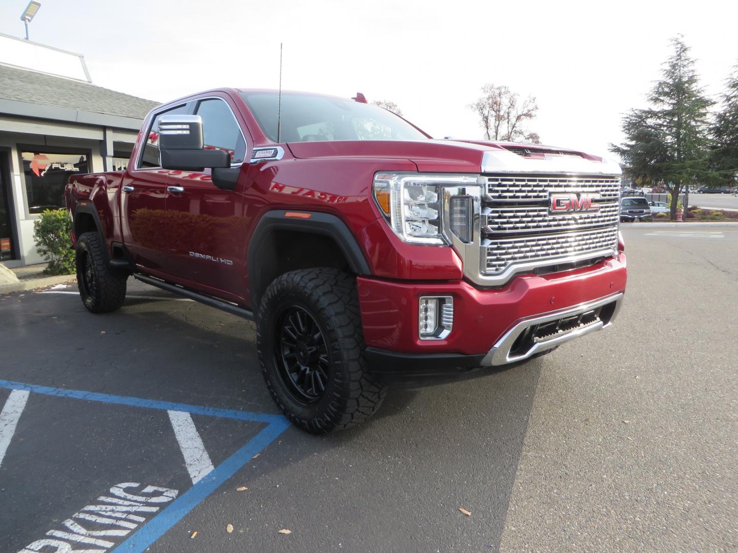 2021 MAROON /BLACK GMC Sierra 3500HD Denali (1GT49WEY1MF) with an Duramax 6.6L Turbo Diesel engine, 10 speed transmission, located at 2630 Grass Valley Highway, Auburn, CA, 95603, (530) 508-5100, 38.937893, -121.095482 - Duramax sitting on a BDS level kit with upper control arms and Fox shocks, 20" XD wheels, and 35" Nitto Ridge Grappler tires. - Photo#2